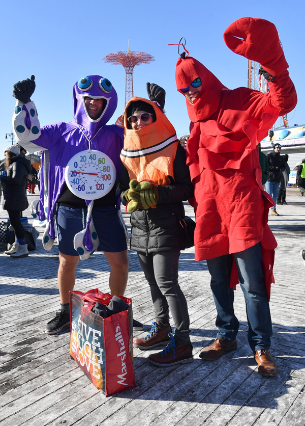 The water’s frigid! Brooklynites dive into Atlantic at Coney New Year’s Day plunge