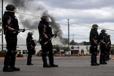 State patrol members guard at the area in the aftermath of a protest against the death in Minneapolis police custody of African-American man George Floyd, in Minneapolis