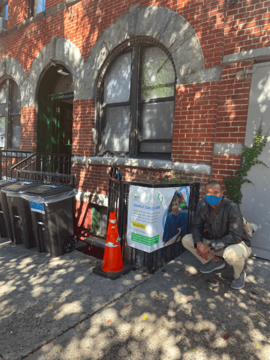 Jabari Brisport poses outside a child care center