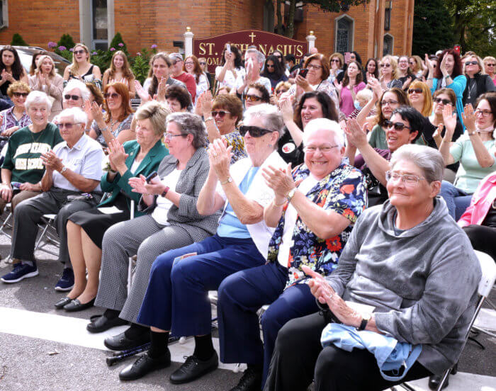 crowd of former students at bishop kearney street renaming
