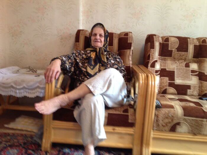 shima oliaee's grandma in a chair