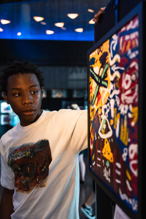 student with work at barclays center