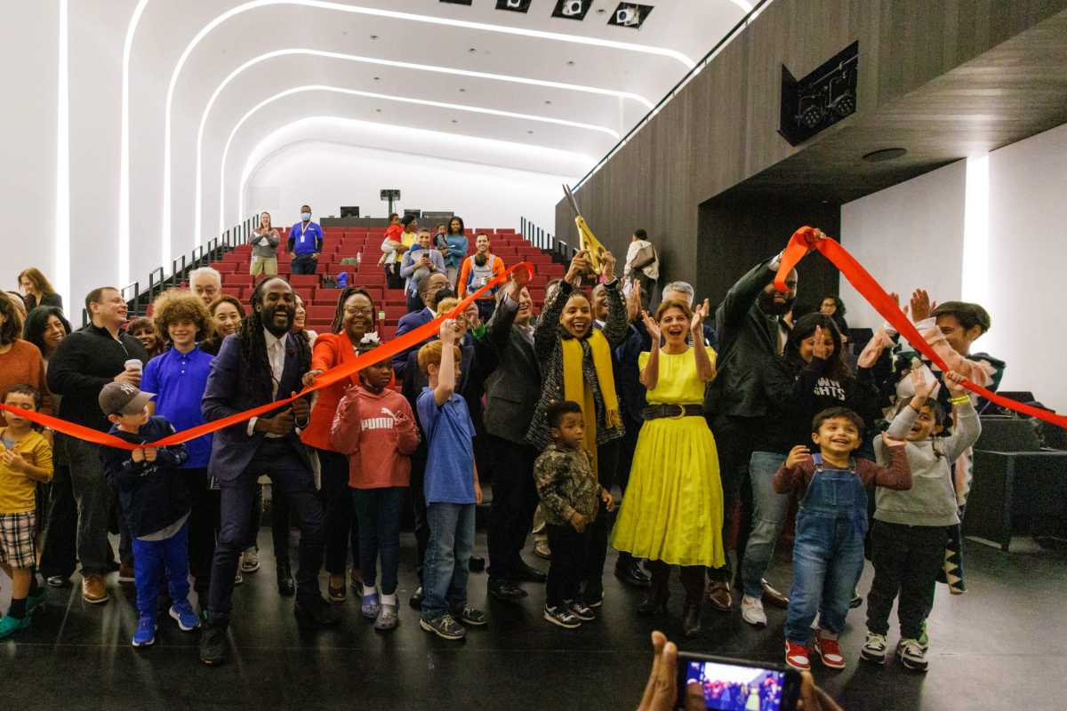 people cut ribbon at brooklyn children's museum