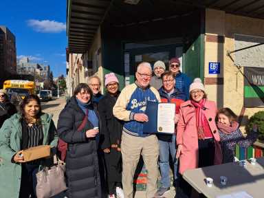 PEOPLE OUTSIDE OF THE FOOD COOP AT WINDSOR TERRACE