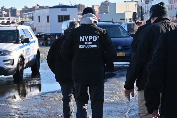 fire investigators on the scene of the fire
