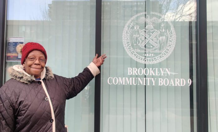 Doreen Douglas standing outside community board 9 office