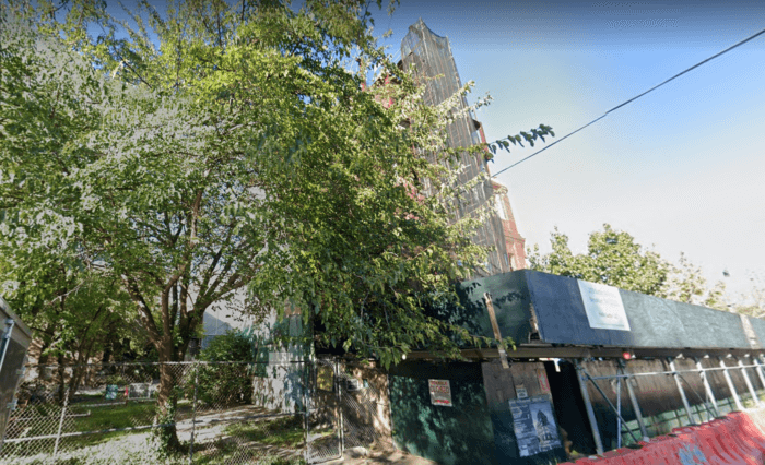 construction site beside brownsville community garden and mural