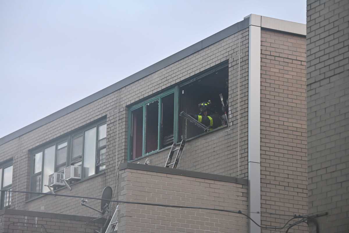 Firefighters work to quash the Brownsville blaze.