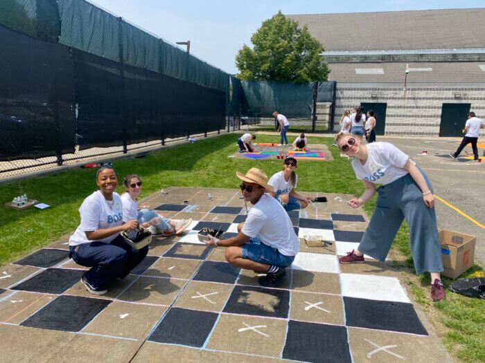 It was all hands on deck as teams of volunteers split up tasks of building equipment and painting murals.