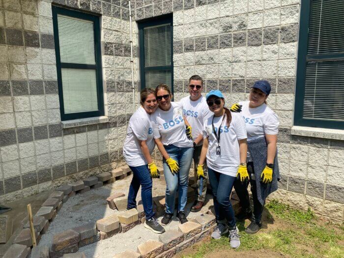 Hugo Boss employees spent the afternoon volunteering at the youth treatment center.