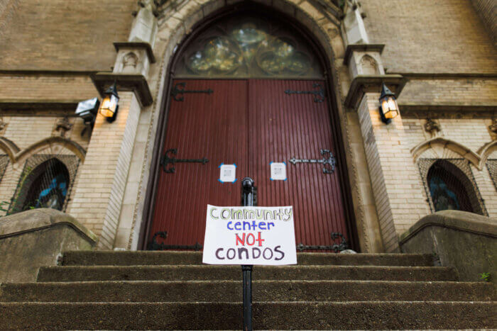 Greenpoint neighbors testify to save Park Church Co-Op during public hearing.