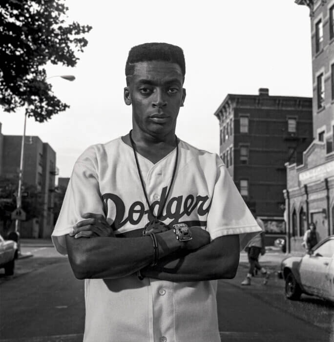 Spike Lee wearing a dodgers jersey
