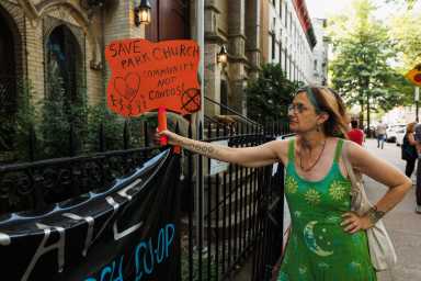 person outside park church co-op