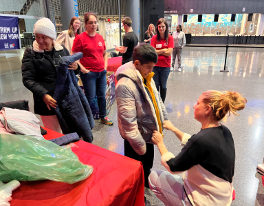 New York Cares hosts 35th annual winter coat drive at Barclays Center.