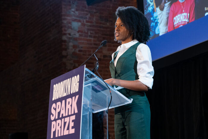 woman accepting award for NIA