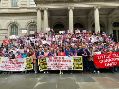 rally against shelter in gravesend city hall