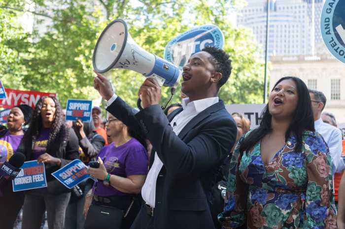 council member chi osse at broker fee bill rally