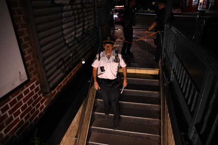 police officer on scene of subway shooting