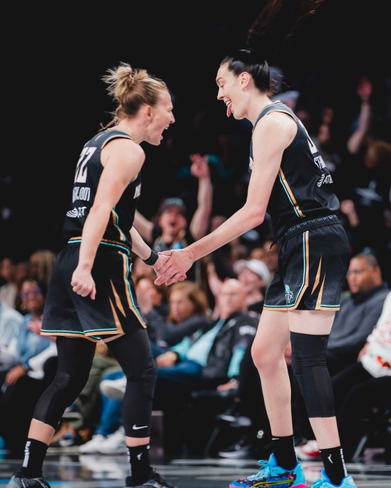 Liberty's Stewie (Breanna Stewart) and Sloot (Courtney Vandersloot) celebrate a sweet play during the semi-finals.