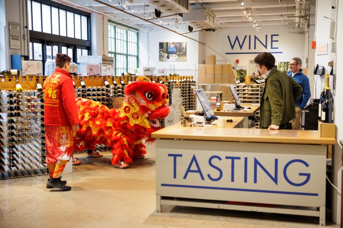 lion dancers in liquor store